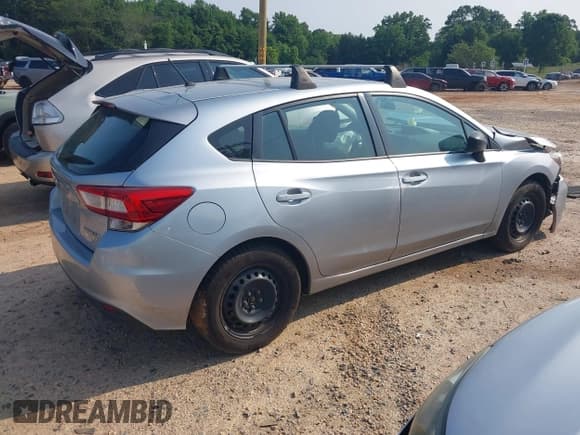 ✅ 2017 Subaru Impreza • VIN: 4S3GTAA63H1734443 • Lot: 42392197. Listed on IAAI with 141,479 mi. Free auction sales archive from the USA and detailed vehicle history report at DreamBid. Image 4.