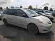 2009 Toyota Sienna LE with VIN 5TDBK23C69S023958, listed as a Copart auction lot 60220025 with 262,409 mi miles and Non repairable. Bid and sale history available at DreamBid. Image 4.