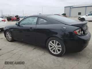 2008 Hyundai Tiburon GS z VIN KMHHM66D28U264874, wystawiony jako Copart lot #44803245 z przebiegiem 193 975 mil mil oraz Szkoda całkowita • Salvage title. Historia ofert i sprzedaży dostępna na DreamBid. Obrazek 2.
