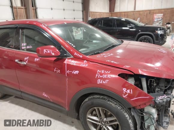 ✅ 2017 Hyundai Santa Fe 2.4L • VIN: 5XYZTDLB1HG413540 • Lot: 43900004. Listed on IAAI with 96,326 mi. Free auction sales archive from the USA and detailed vehicle history report at DreamBid. Image 18.