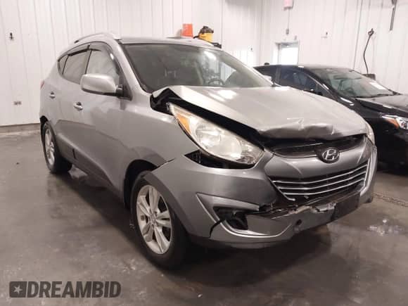 2011 Hyundai Tucson GLS z VIN KM8JU3AC7BU262415, wystawiony jako IAAI lot #43439786 z przebiegiem 88 234 mil mil oraz . Historia ofert i sprzedaży dostępna na DreamBid. Obrazek 6.