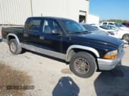 ✅ 2003 Dodge Dakota SLT • VIN: 1D7HL48X93S151422 • Lot: 40661577. Wystawiony na IAAI z przebiegiem 238 586 mil. Bezpłatny archiwum sprzedaży aukcyjnych z USA i szczegółowy raport historii pojazdu na DreamBid. Zdjęcie 1.