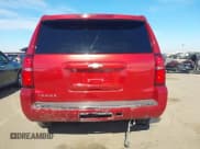 ✅ 2015 Chevrolet Tahoe LTZ • VIN: 1GNSCCKC2FR216758 • Lot: 43689893. Listed on IAAI with 184,851 mi. Free auction sales archive from the USA and detailed vehicle history report at DreamBid. Image 6.