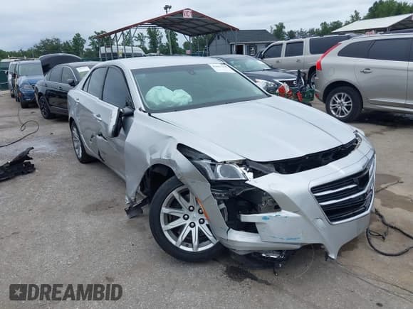 ✅ 2015 Cadillac CTS AWD • VIN: 1G6AW5SX3F0142431 • Lot: 43027413. Listed on IAAI with 125,276 mi. Free auction sales archive from the USA and detailed vehicle history report at DreamBid. Image 1.