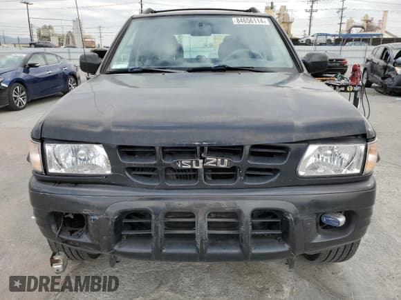 ✅ 2001 Isuzu Rodeo S • VIN: 4S2CK58W814333364 • Lot: 84656114. Listed on Copart with 140,489 mi. Free auction sales archive from the USA and detailed vehicle history report at DreamBid. Image 5.