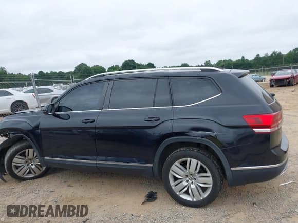 ✅ 2019 Volkswagen Atlas SEL • VIN: 1V2ER2CA1KC519716 • Lot: 43029509. Listed on IAAI with 79,854 mi. Free auction sales archive from the USA and detailed vehicle history report at DreamBid. Image 14.