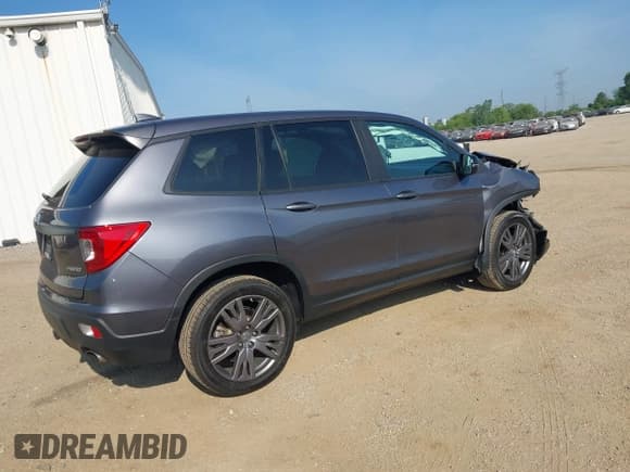 ✅ 2021 Honda Passport EX-L • VIN: 5FNYF8H51MB027490 • Lot: 42527501. Listed on IAAI with 85,635 mi. Free auction sales archive from the USA and detailed vehicle history report at DreamBid. Image 4.