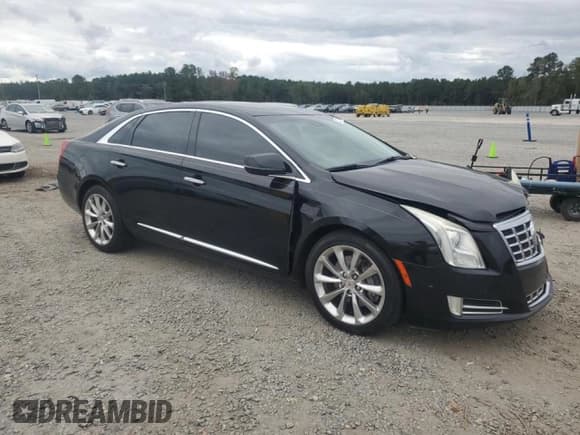 ✅ 2014 Cadillac XTS Luxury • VIN: 2G61M5S35E9124360 • Lot: 82227175. Listed on Copart with 204,403 mi. Free auction sales archive from the USA and detailed vehicle history report at DreamBid. Image 4.