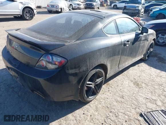 2008 Hyundai Tiburon GS с VIN KMHHM66D88U264507, выставлен на аукционе IAAI как лот 41441058 с пробегом 181 891 миль миль и . История ставок и продаж доступна на DreamBid. Изображение 4.