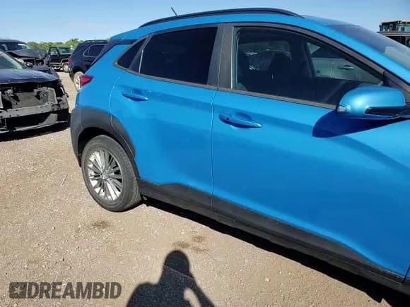 ✅ 2018 Hyundai Kona SEL • VIN: KM8K62AA9JU119407 • Лот: 70354053. Опубликован ранее на Copart с пробегом 31 900 миль. Бесплатный доступ к архиву аукционных продаж из США и подробный отчёт об истории автомобиля на DreamBid. Изображение 11.