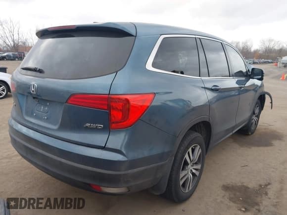 ✅ 2017 Honda Pilot EX-L • VIN: 5FNYF6H5XHB001772 • Lot: 43771030. Listed on IAAI with 126,659 mi. Free auction sales archive from the USA and detailed vehicle history report at DreamBid. Image 4.