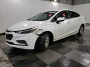 ✅ 2018 Chevrolet Cruze LT • VIN: 1G1BE5SM0J7115240 • Lot: 85850895. Listed on Copart with 143,645 mi. Free auction sales archive from the USA and detailed vehicle history report at DreamBid. Image 1.