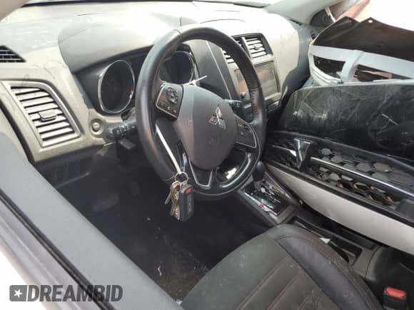 2018 Mitsubishi Outlander SE z VIN JA4AR3AW3JZ012651, wystawiony jako Copart lot #59735465 z przebiegiem Nie podano mil oraz Szkoda całkowita • Salvage title. Historia ofert i sprzedaży dostępna na DreamBid. Obrazek 8.