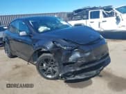 ✅ 2025 Tesla Model Y Long Range • VIN: 7SAYGDED9SF215904 • Lot: 43470903. Listed on IAAI with 27,348 mi. Free auction sales archive from the USA and detailed vehicle history report at DreamBid. Image 6.