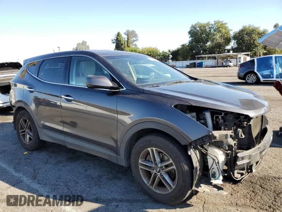 2018 Hyundai Santa Fe 2.4L with VIN 5XYZT3LB2JG509984, listed as a Copart auction lot 85510595 with 103,988 mi miles and Salvage title. Bid and sale history available at DreamBid. Image 4.
