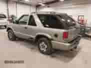 2004 Chevrolet Blazer LS with VIN 1GNCT18X64K126098, listed as a IAAI auction lot 41744502 with 26 mi miles and . Bid and sale history available at DreamBid. Image 3.