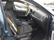 ✅ 2016 Mazda CX-5 Touring • VIN: JM3KE2CY0G0752015 • Lot: 43774015. Wystawiony na IAAI z przebiegiem 150 233 mil. Bezpłatny archiwum sprzedaży aukcyjnych z USA i szczegółowy raport historii pojazdu na DreamBid. Zdjęcie 5.