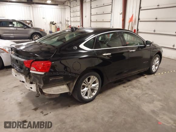✅ 2015 Chevrolet Impala LT • VIN: 1G1115SL2FU106742 • Lot: 43204389. Listed on IAAI with 69,656 mi. Free auction sales archive from the USA and detailed vehicle history report at DreamBid. Image 4.