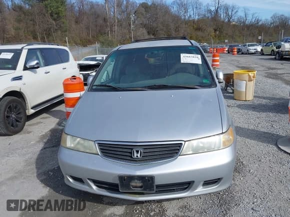 ✅ 2001 Honda Odyssey EX • VIN: 2HKRL18611H601564 • Lot: 43683828. Listed on IAAI with 184,613 mi. Free auction sales archive from the USA and detailed vehicle history report at DreamBid. Image 12.