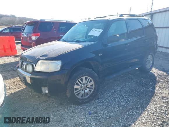 2005 Mercury Mariner Luxury z VIN 4M2YU561X5DJ15381, wystawiony jako IAAI lot #41295590 z przebiegiem 215 077 mil mil oraz . Historia ofert i sprzedaży dostępna na DreamBid. Obrazek 2.