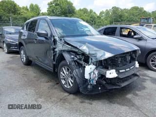 ✅ 2022 Mazda CX-5 S Preferred • VIN: JM3KFBCM6N0557317 • Lot: 42639513. Listed on IAAI with 39,794 mi. Free auction sales archive from the USA and detailed vehicle history report at DreamBid. Image 1.