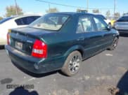 ✅ 2002 Mazda Protege DX • VIN: JM1BJ225021620967 • Lot: 43484388. Wystawiony na IAAI z przebiegiem 200 574 mil. Bezpłatny archiwum sprzedaży aukcyjnych z USA i szczegółowy raport historii pojazdu na DreamBid. Zdjęcie 4.