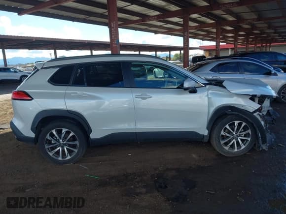 ✅ 2022 Toyota Corolla Cross XLE • VIN: 7MUDAAAG3NV014484 • Lot: 43761950. Listed on IAAI with 34,507 mi. Free auction sales archive from the USA and detailed vehicle history report at DreamBid. Image 13.