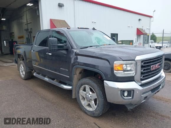 ✅ 2015 GMC Sierra 2500HD SLT • VIN: 1GT12ZEGXFF129295 • Лот: 42664288. Опубликован ранее на IAAI с пробегом 219 620 миль. Бесплатный доступ к архиву аукционных продаж из США и подробный отчёт об истории автомобиля на DreamBid. Изображение 1.