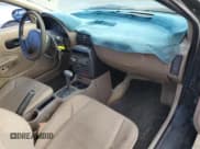 ✅ 1997 Saturn SC • VIN: 1G8ZF1286VZ350275 • Лот: 83010514. Опубликован ранее на Copart с пробегом 143 241 миль. Бесплатный доступ к архиву аукционных продаж из США и подробный отчёт об истории автомобиля на DreamBid. Изображение 8.