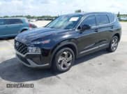 ✅ 2021 Hyundai Santa Fe SE • VIN: 5NMS14AJ0MH309235 • Lot: 41919206. Listed on IAAI with 41,453 mi. Free auction sales archive from the USA and detailed vehicle history report at DreamBid. Image 2.