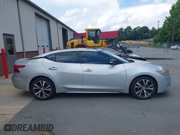 ✅ 2016 Nissan Maxima Platinum • VIN: 1N4AA6AP2GC375192 • Lot: 42774874. Listed on IAAI with 129,967 mi. Free auction sales archive from the USA and detailed vehicle history report at DreamBid. Image 12.