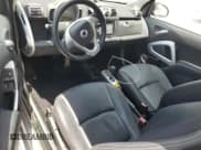 ✅ 2009 Smart fortwo Passion • VIN: WMEEK31XX9K253259 • Лот: 63807705. Опубликован ранее на Copart с пробегом 79 084 миль. Бесплатный доступ к архиву аукционных продаж из США и подробный отчёт об истории автомобиля на DreamBid. Изображение 8.