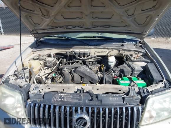 2005 Mercury Mariner Luxury z VIN 4M2YU56125DJ05993, wystawiony jako IAAI lot #41745773 z przebiegiem 265 895 mil mil oraz . Historia ofert i sprzedaży dostępna na DreamBid. Obrazek 10.