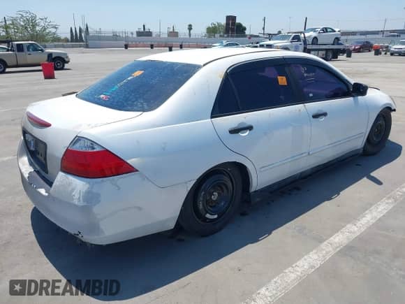 2007 Honda Accord VP with VIN JHMCM56117C005391, listed as a IAAI auction lot 42885369 with 123,217 mi miles and . Bid and sale history available at DreamBid. Image 4.