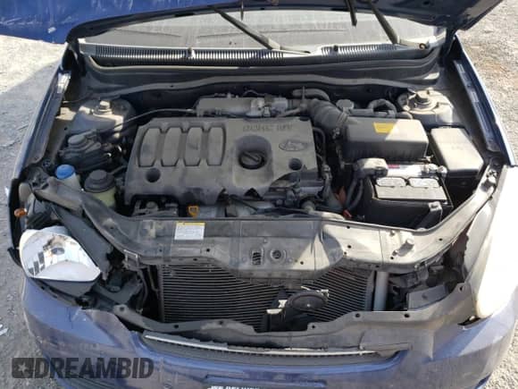 2009 Hyundai Accent Auto GLS z VIN KMHCN46C29U328657, wystawiony jako Copart lot #77827564 z przebiegiem 56 314 mil mil oraz Szkoda całkowita • Salvage title. Historia ofert i sprzedaży dostępna na DreamBid. Obrazek 13.