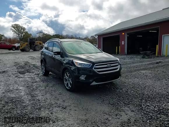 2017 Ford Escape Titanium с VIN 1FMCU9J92HUA12041, выставлен на аукционе Copart как лот 89665255 с пробегом 114 448 миль миль и Списание • Salvage title. История ставок и продаж доступна на DreamBid. Изображение 14.
