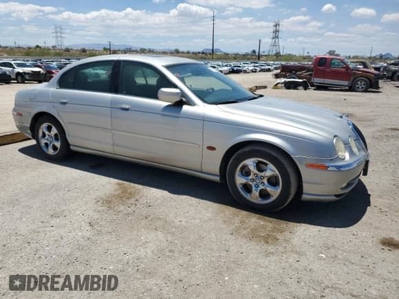 ✅ 2000 Jaguar S-Type V6 • VIN: SAJDA01CXYFL09248 • Lot: 59061155. Listed on Copart with 56,968 mi. Free auction sales archive from the USA and detailed vehicle history report at DreamBid. Image 4.