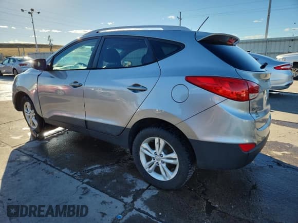 ✅ 2013 Hyundai Tucson GLS • VIN: KM8JUCAC2DU561460 • Lot: 85914915. Listed on Copart with 191,083 mi. Free auction sales archive from the USA and detailed vehicle history report at DreamBid. Image 2.