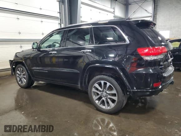 ✅ 2017 Jeep Grand Cherokee Overland • VIN: 1C4RJFCG8HC738106 • Lot: 80833155. Listed on Copart with 127,960 mi. Free auction sales archive from the USA and detailed vehicle history report at DreamBid. Image 2.