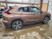 ✅ 2022 Mitsubishi Eclipse Cross LE • VIN: JA4ATVAA9NZ602876 • Lot: 95723675. Listed on Copart with 82,819 mi. Free auction sales archive from the USA and detailed vehicle history report at DreamBid. Image 3.