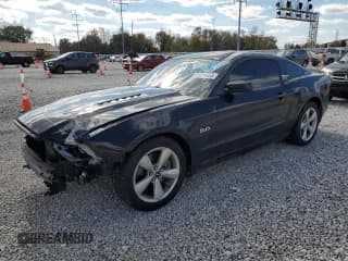 ✅ 2013 Ford Mustang GT • VIN: 1ZVBP8CF0D5215869 • Lot: 89615435. Listed on Copart with 94,459 mi. Free auction sales archive from the USA and detailed vehicle history report at DreamBid. Image 1.