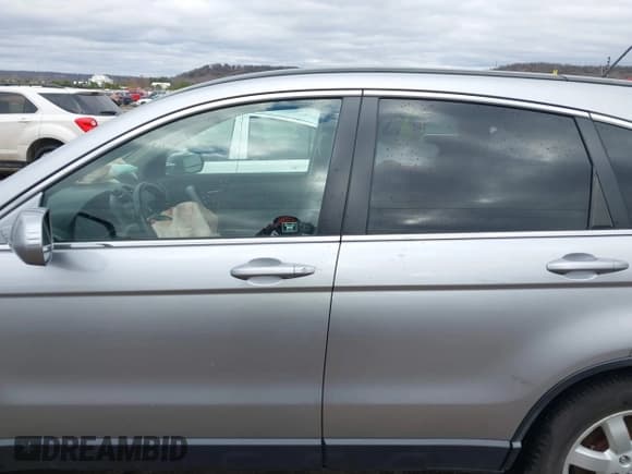 ✅ 2007 Honda CR-V EX-L • VIN: JHLRE48777C103364 • Лот: 41216423. Опубликован ранее на IAAI с пробегом 152 630 миль. Бесплатный доступ к архиву аукционных продаж из США и подробный отчёт об истории автомобиля на DreamBid. Изображение 14.