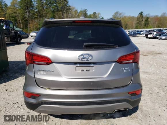 ✅ 2018 Hyundai Santa Fe 2.4L • VIN: 5XYZUDLB4JG536235 • Lot: 51336383. Wystawiony na Copart z przebiegiem 58 091 mil mil. Skorzystaj z bezpłatnego archiwum sprzedaży aukcyjnych z USA i zobacz szczegółowy raport historii pojazdu na DreamBid. Zdjęcie 6.