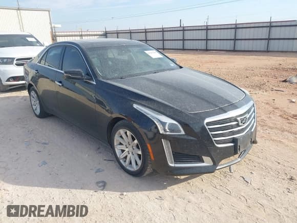✅ 2015 Cadillac CTS Luxury RWD • VIN: 1G6AR5SX5F0142437 • Lot: 43243165. Listed on IAAI with 152,252 mi. Free auction sales archive from the USA and detailed vehicle history report at DreamBid. Image 1.