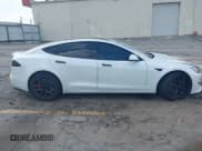 ✅ 2023 Tesla Model S Plaid • VIN: 5YJSA1E63PF521945 • Lot: 43248046. Listed on IAAI with 26,327 mi. Free auction sales archive from the USA and detailed vehicle history report at DreamBid. Image 14.