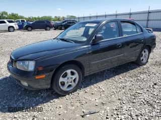 2003 Hyundai Elantra GLS z VIN KMHDN45D43U699230, wystawiony jako Copart lot #68822534 z przebiegiem 160 821 mil mil oraz Nie do naprawy • Non repairable. Historia ofert i sprzedaży dostępna na DreamBid. Obrazek 1.