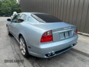 ✅ 2004 Maserati Coupe • VIN: ZAMBC38A240012148 • Lot: 66689845. Wystawiony na Copart z przebiegiem 87 977 mil. Bezpłatny archiwum sprzedaży aukcyjnych z USA i szczegółowy raport historii pojazdu na DreamBid. Zdjęcie 3.