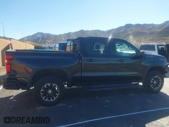 ✅ 2022 Chevrolet Silverado 1500 ZR2 • VIN: 3GCUDHELXNG599564 • Лот: 43528446. Опубликован ранее на IAAI с пробегом 36 704 миль. Бесплатный доступ к архиву аукционных продаж из США и подробный отчёт об истории автомобиля на DreamBid. Изображение 13.