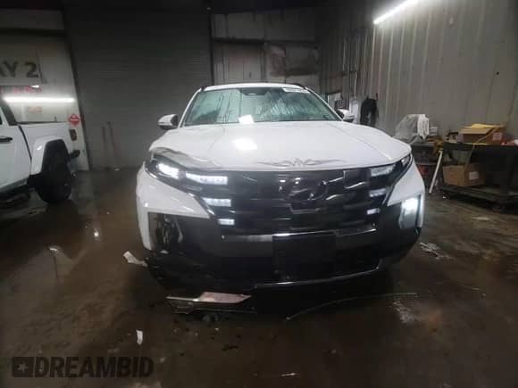 2022 Hyundai Santa Cruz Limited с VIN 5NTJEDAF3NH028869, выставлен на аукционе Copart как лот 88071035 с пробегом 18 304 миль миль и Списание • Salvage title. История ставок и продаж доступна на DreamBid. Изображение 13.