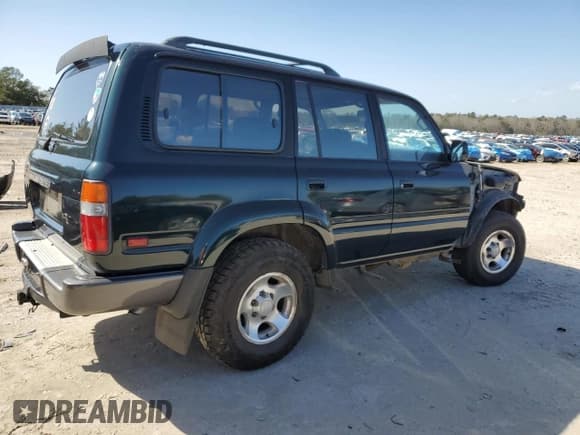 ✅ 1995 Toyota Land Cruiser • VIN: JT3DJ81W6S0106332 • Lot: 47772055. Listed on Copart with 214,499 mi. Free auction sales archive from the USA and detailed vehicle history report at DreamBid. Image 3.